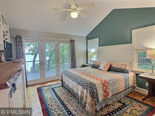 Retreat to the lakeside ownerâs suite complete with glass door to a lakeside deck with stunning shoreline views.