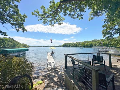 Imagine taking in the views from the deck on waters' edge, towering trees offers shade on hot summer days.