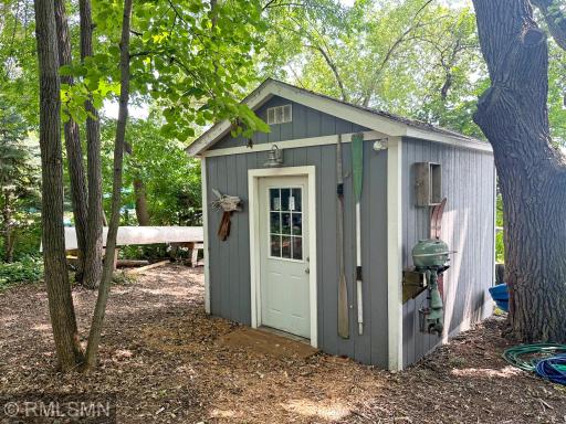 Keep all your lake toys and tools in one place, this lakeside shed is the perfect addition to this lake home.