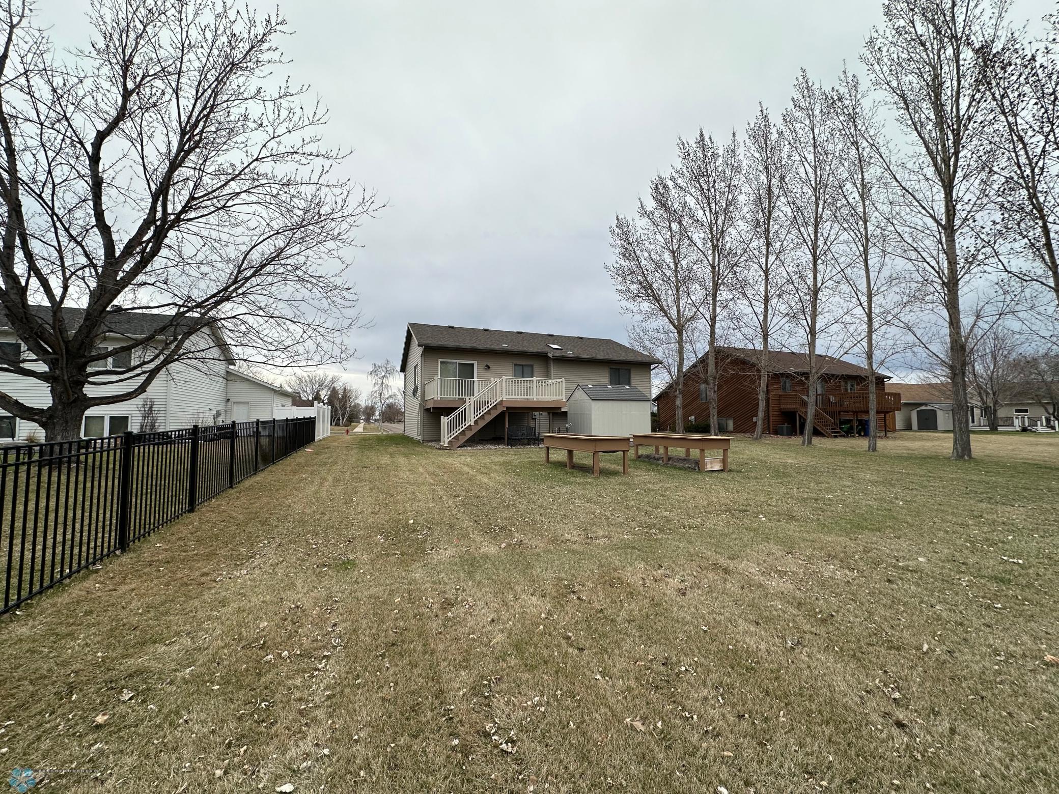 Huge back yard with raise planters