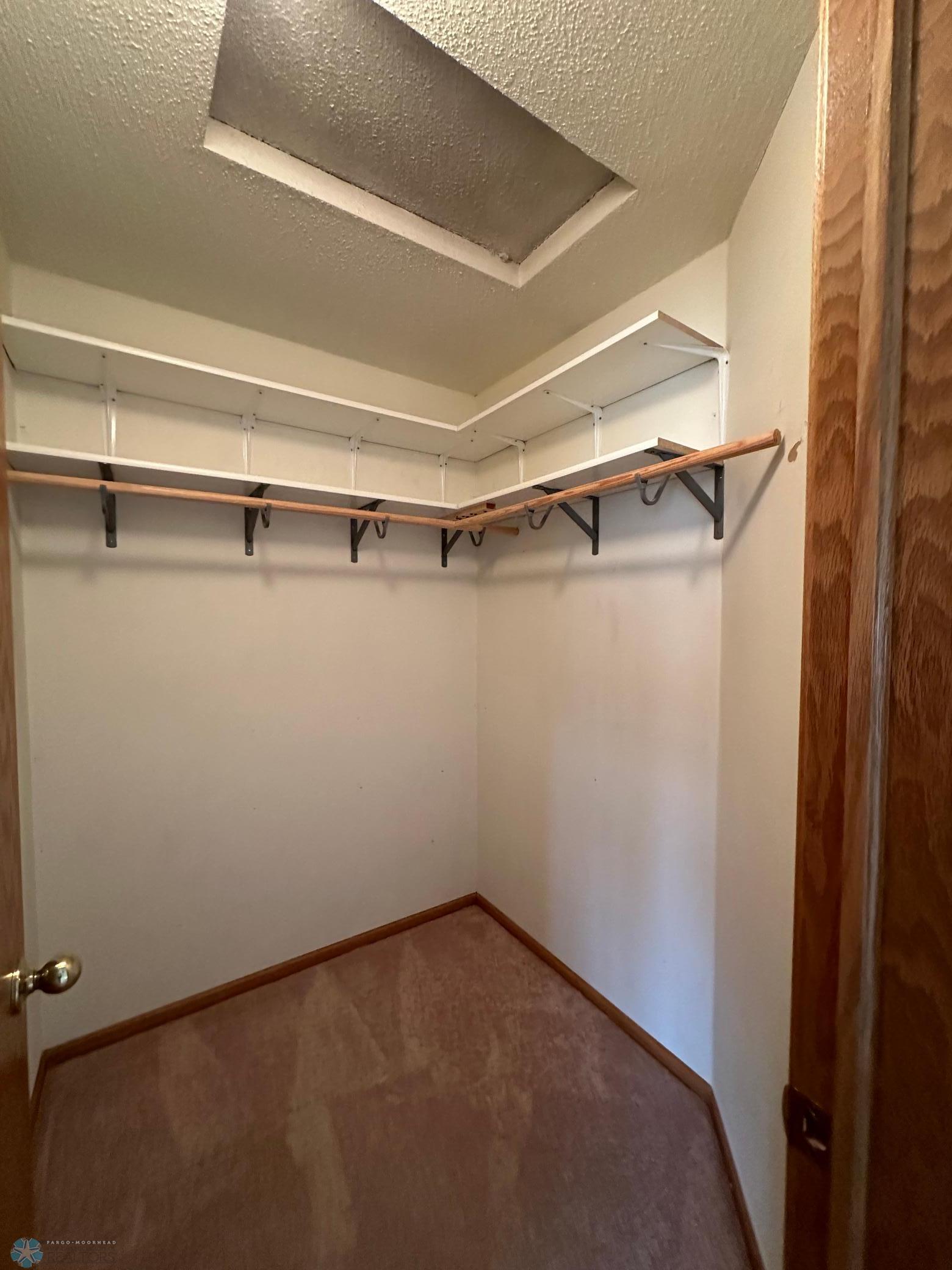 Primary bedroom walk-in Closet