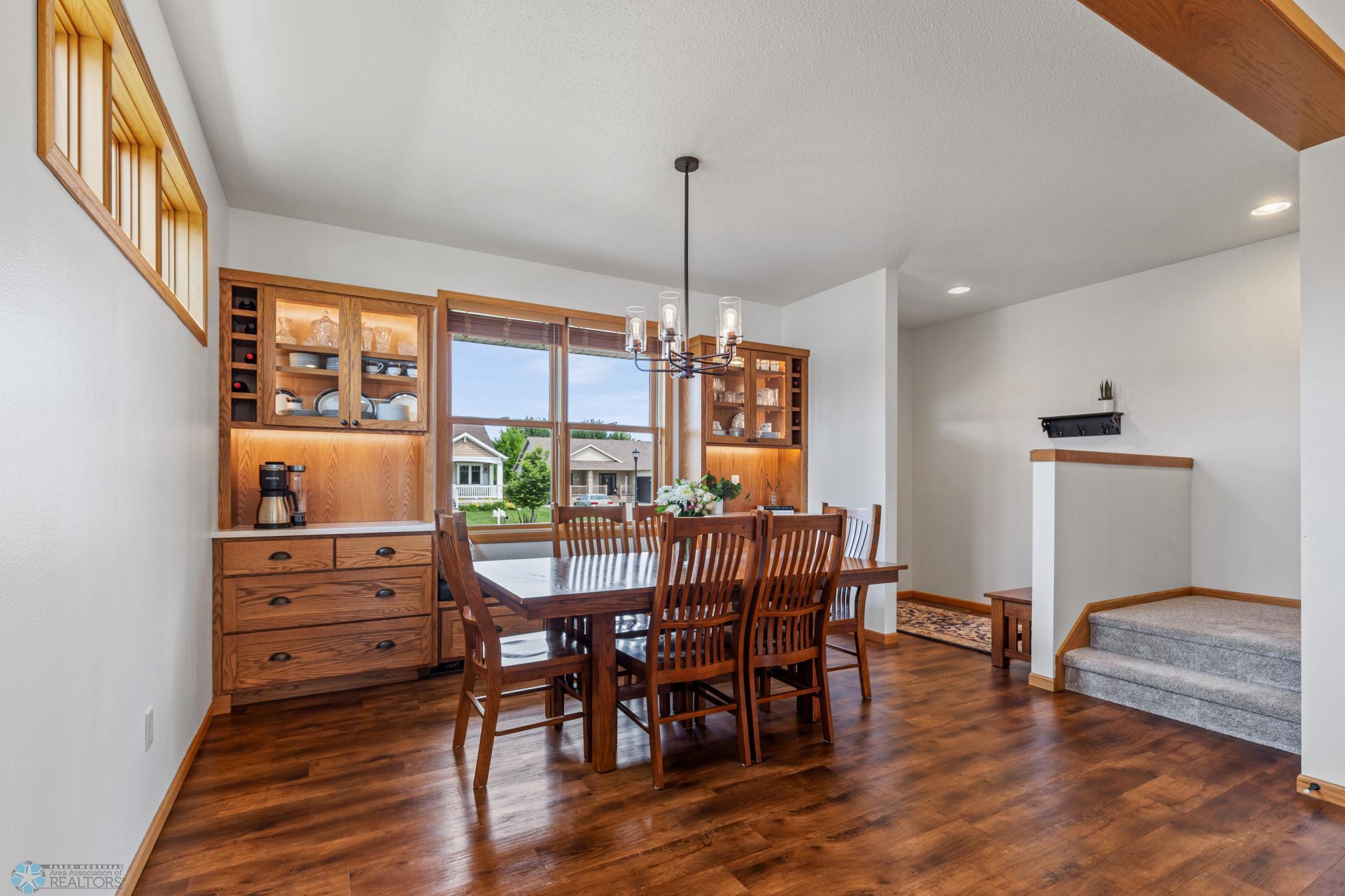 Dining Room - Beautiful Built-In's, New Light Fixture, & Vinyl Plank Flooring