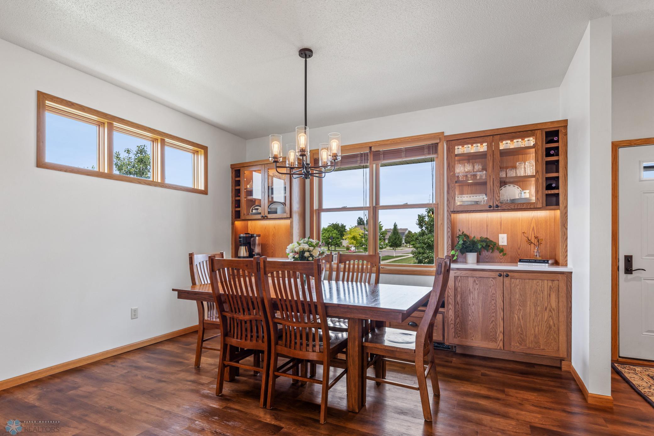 Dining Room - Beautiful Built-In's, New Light Fixture, & Vinyl Plank Flooring