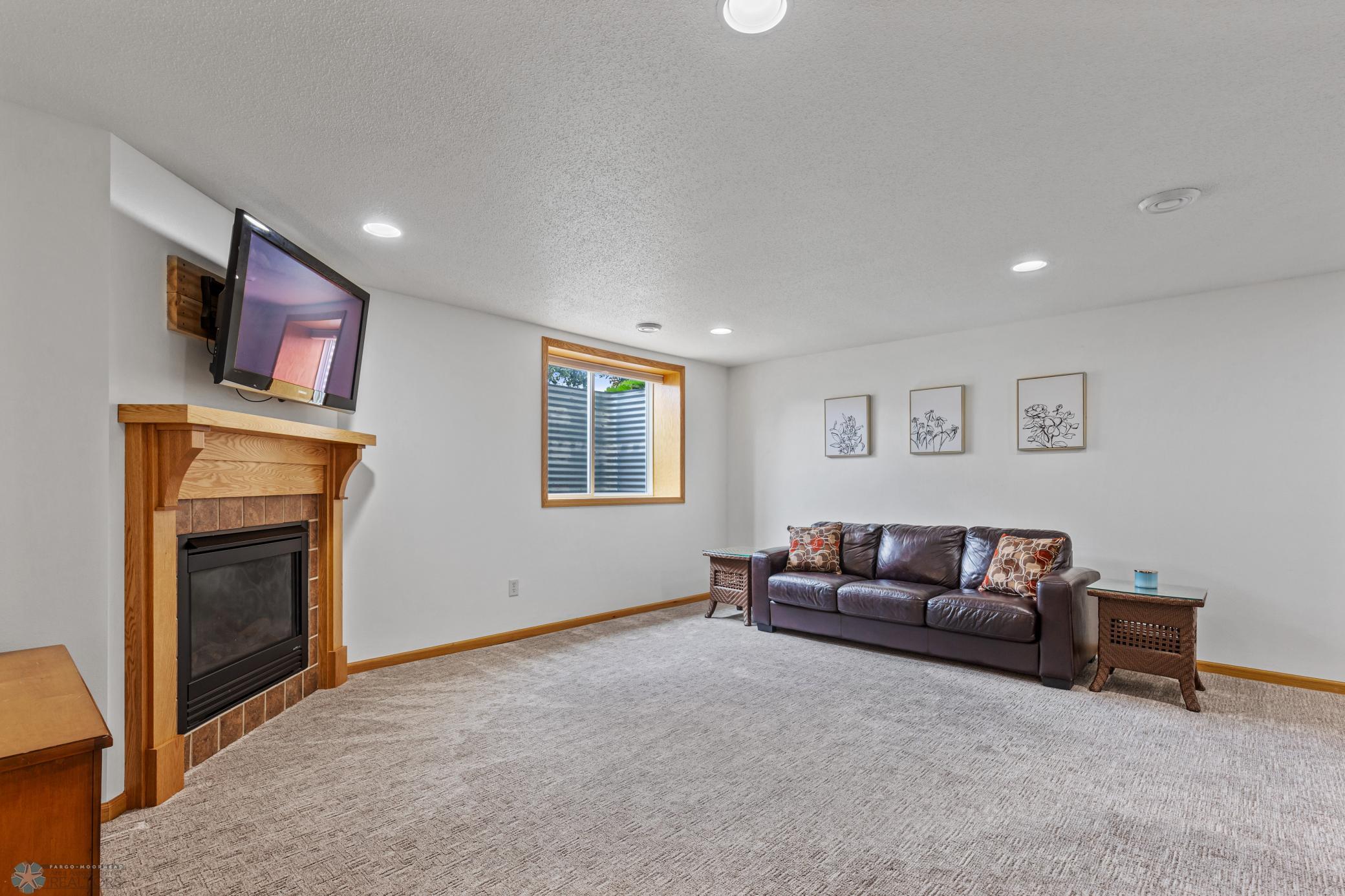 Family Room - Gas Fireplace & TV (included)