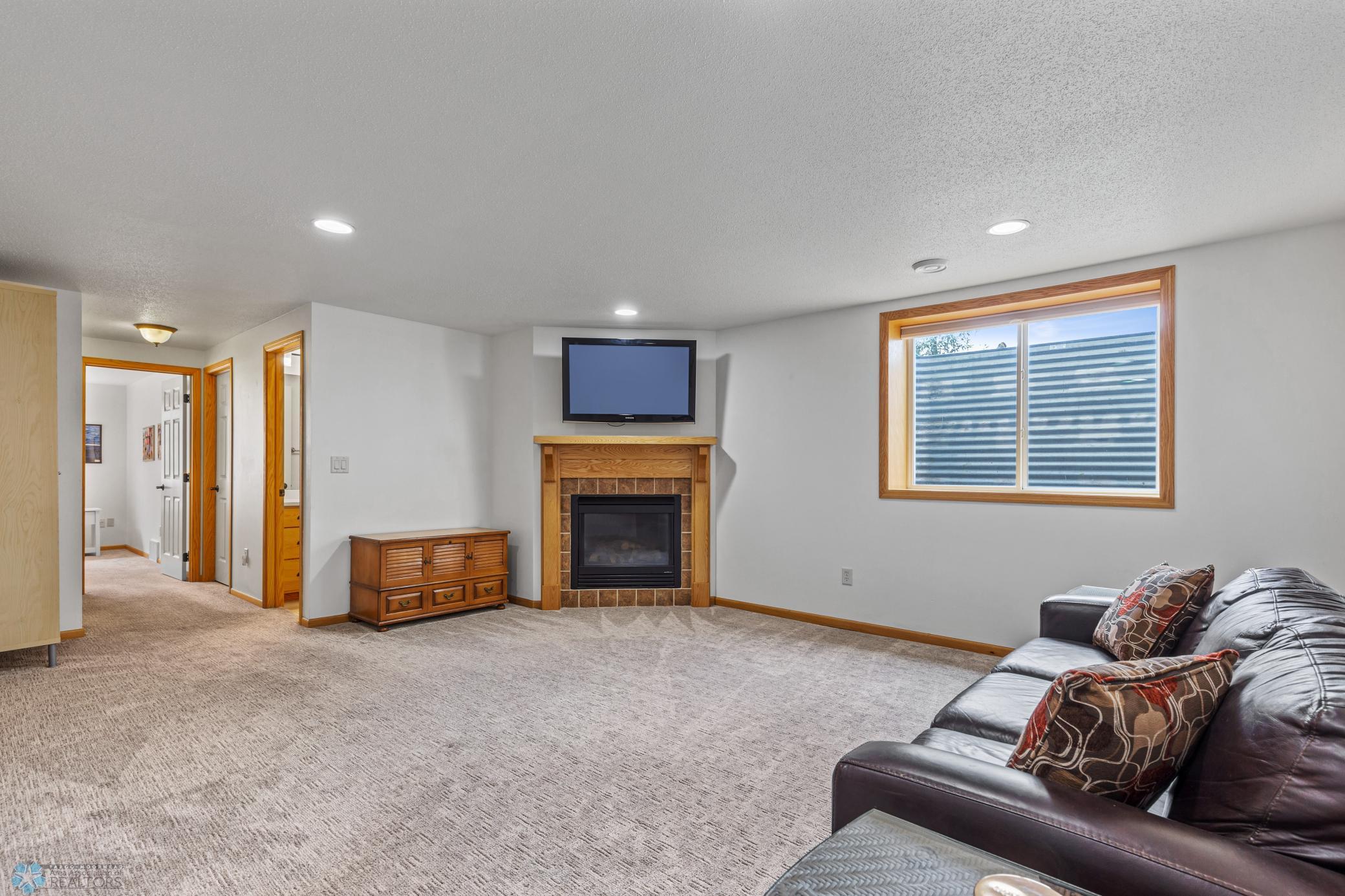 Family Room - Gas Fireplace & TV (included)