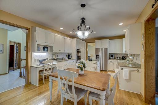 Enjoy cooking in this beautifully renovated kitchen with updated cabinets, quartz counters and stainless steel appliances