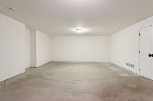 Massive workshop/storage. Just add carpet for additional finished sq footage