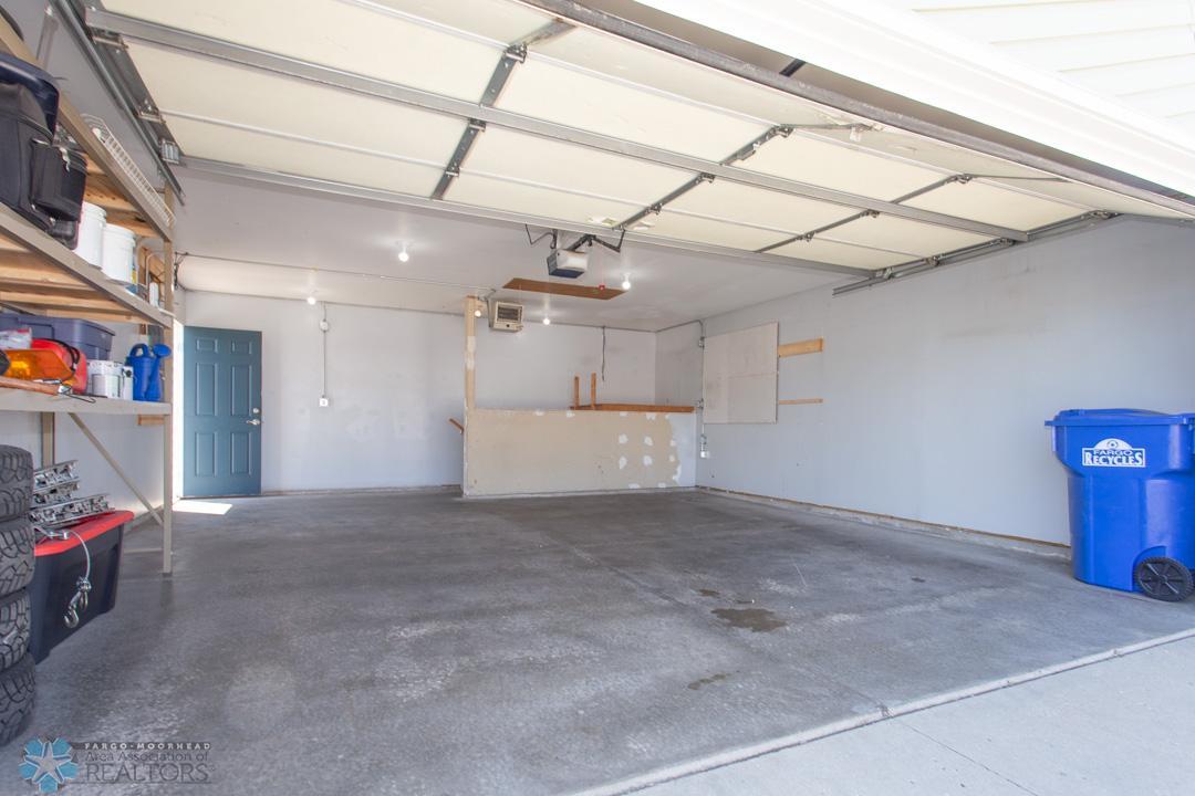 Insulated Heated Garage with 220 Electrical Outlets.