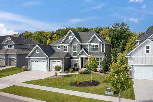 This absolutely stunning Hanson Builders 2 story, sits on the doorstep of the 5,000 acre Elm Creek Park Reserve!