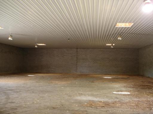 14' Pass-thru doors on East / West Side of Arena & Paved on Both Sides