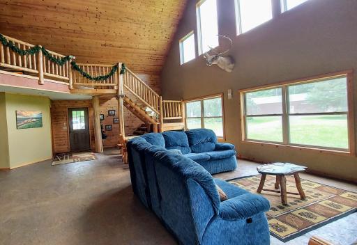 Photo for 11070 County Road 25, Mizpah, MN 56660 - Listing #6573239 Lodge looking at split rail staircase to gameroom