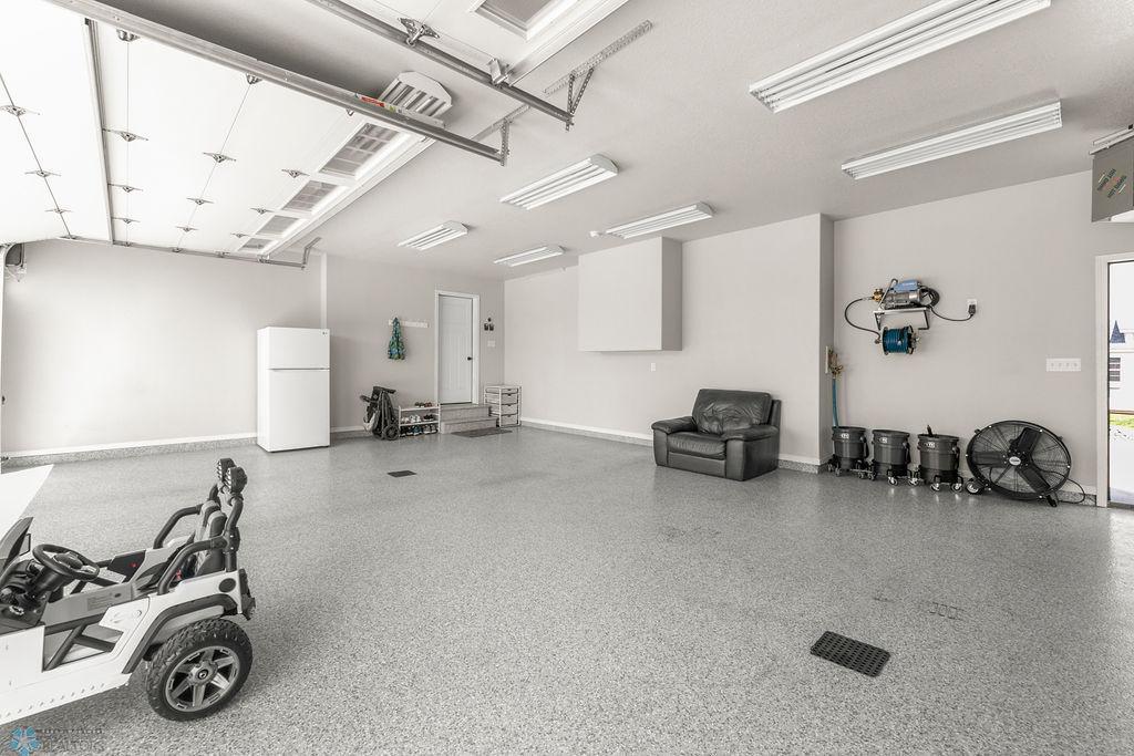 Fully finished + heated 3 stall garage