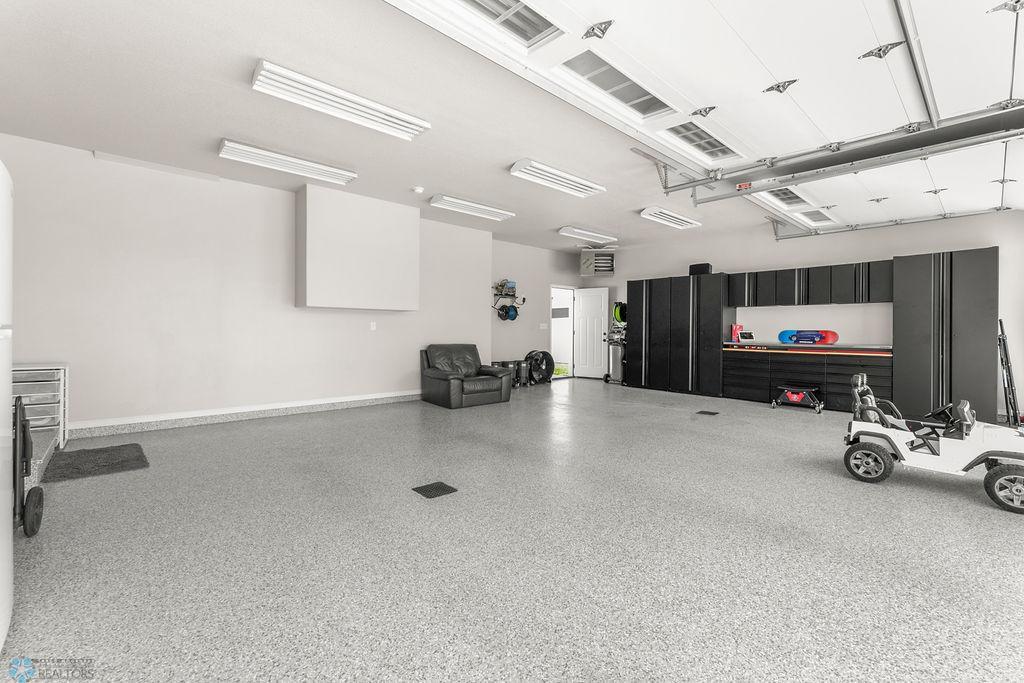 Fully finished + heated 3 stall garage