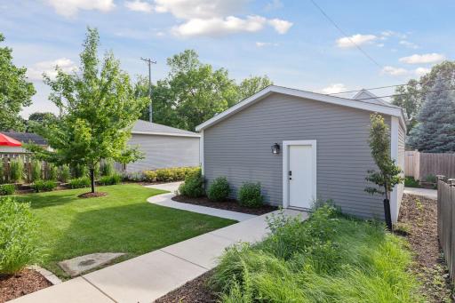 Two stall garage with garage organizer and bike racks.