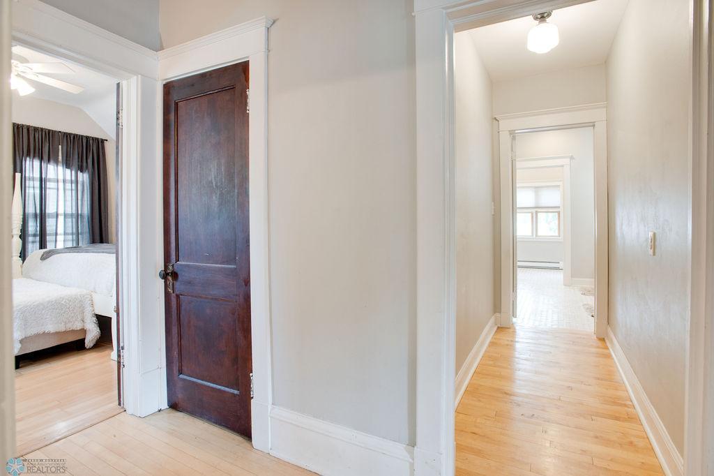 Hallway to upper level bath/laundry
