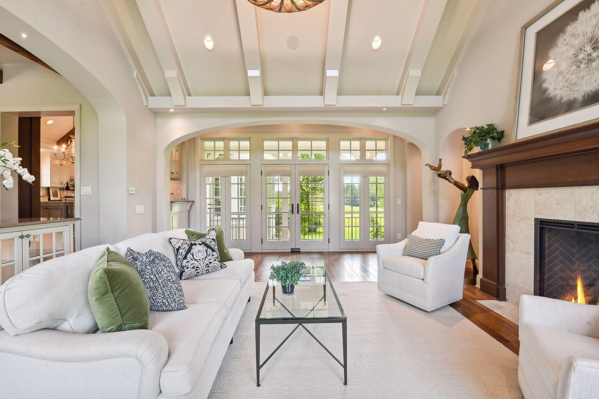 One of several access points to the upper balcony with views of the backyard and golf course beyond