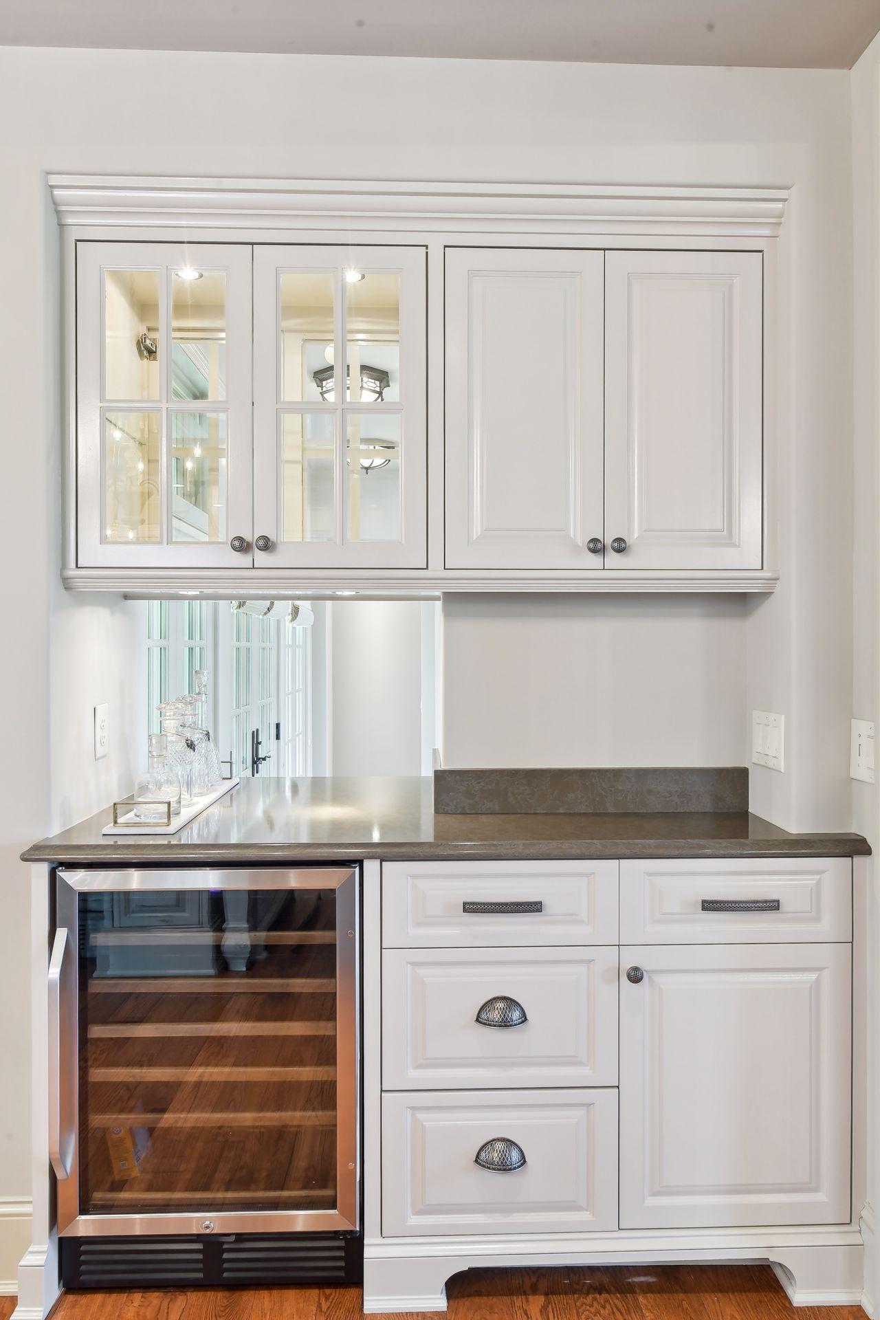 Kitchen bar area with pass through to the living room comes in handy when entertaining