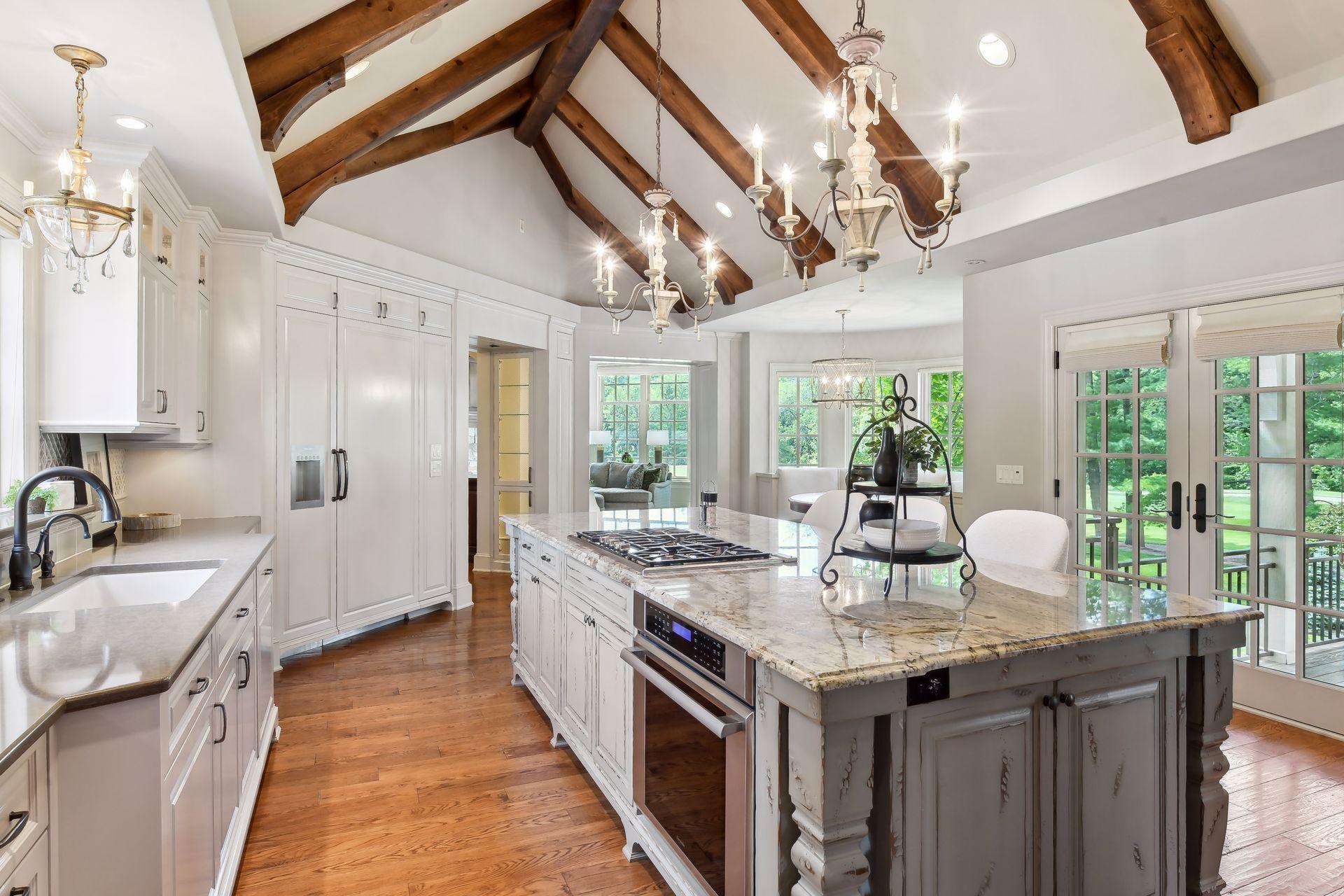 French doors to the back balcony allow for easy access to the grill and dining al fresco