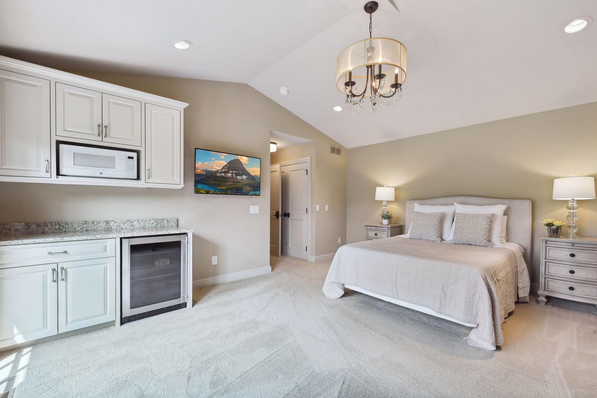 The home's second bedroom is located upstairs as its own private ensuite, making it an ideal spot for visiting guests or live-in nanny quarters