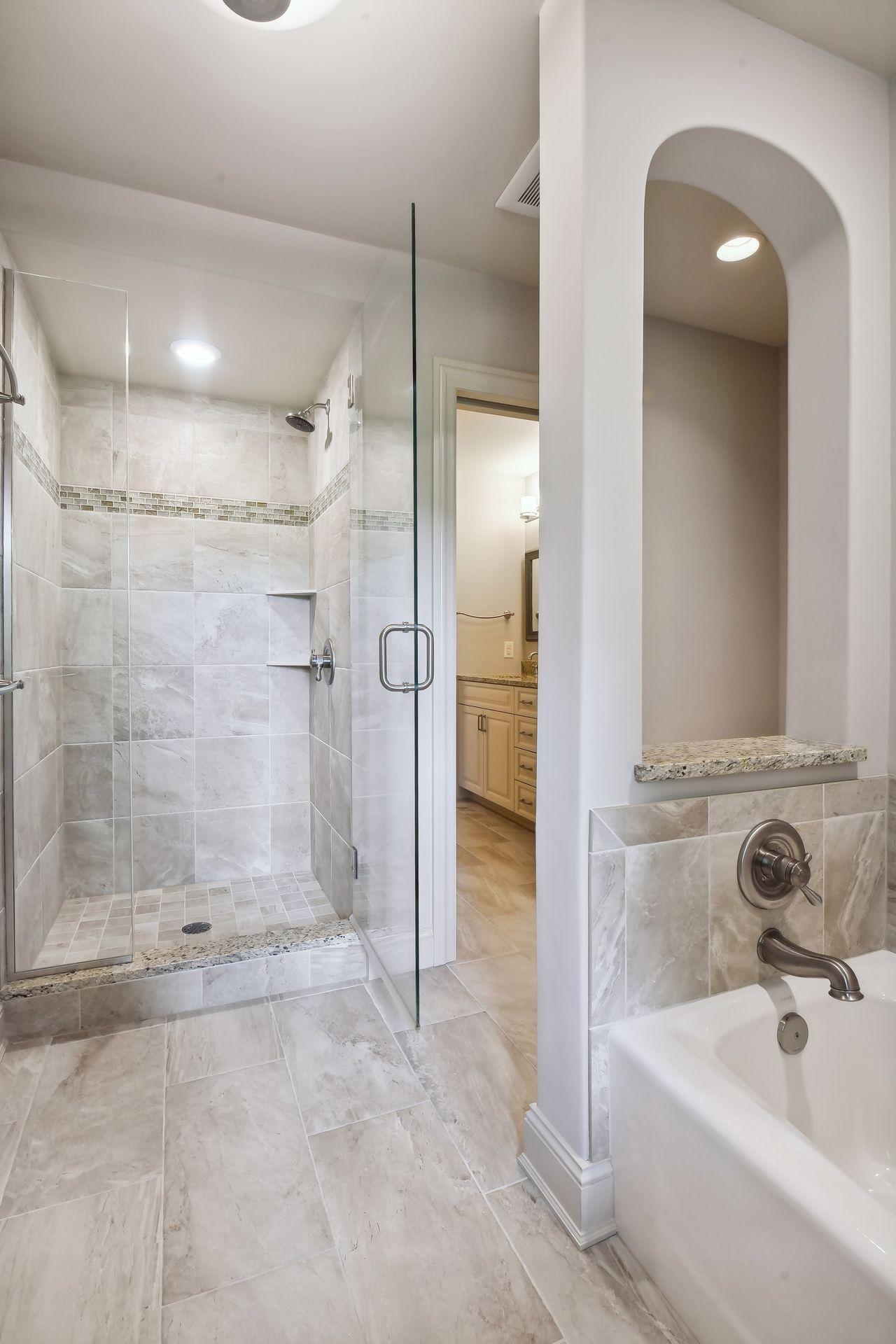 Separate walk-in shower and bathtub
