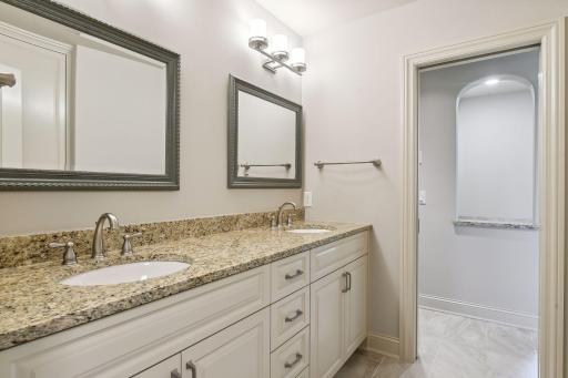BRs #3 and #4 share this full bath with dual sinks, shower and tub
