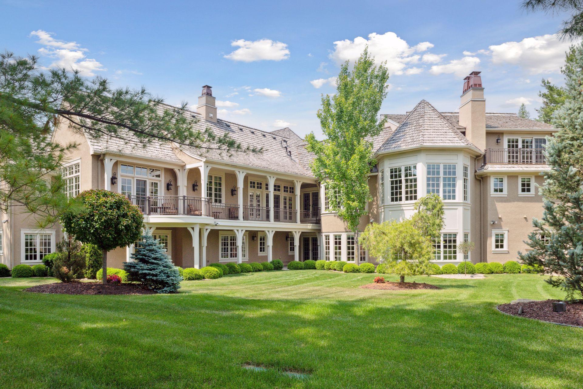 The exquisite architectural design and details carry through to the back of the home