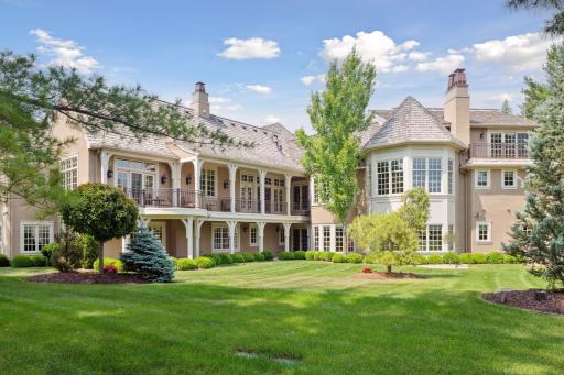The exquisite architectural design and details carry through to the back of the home