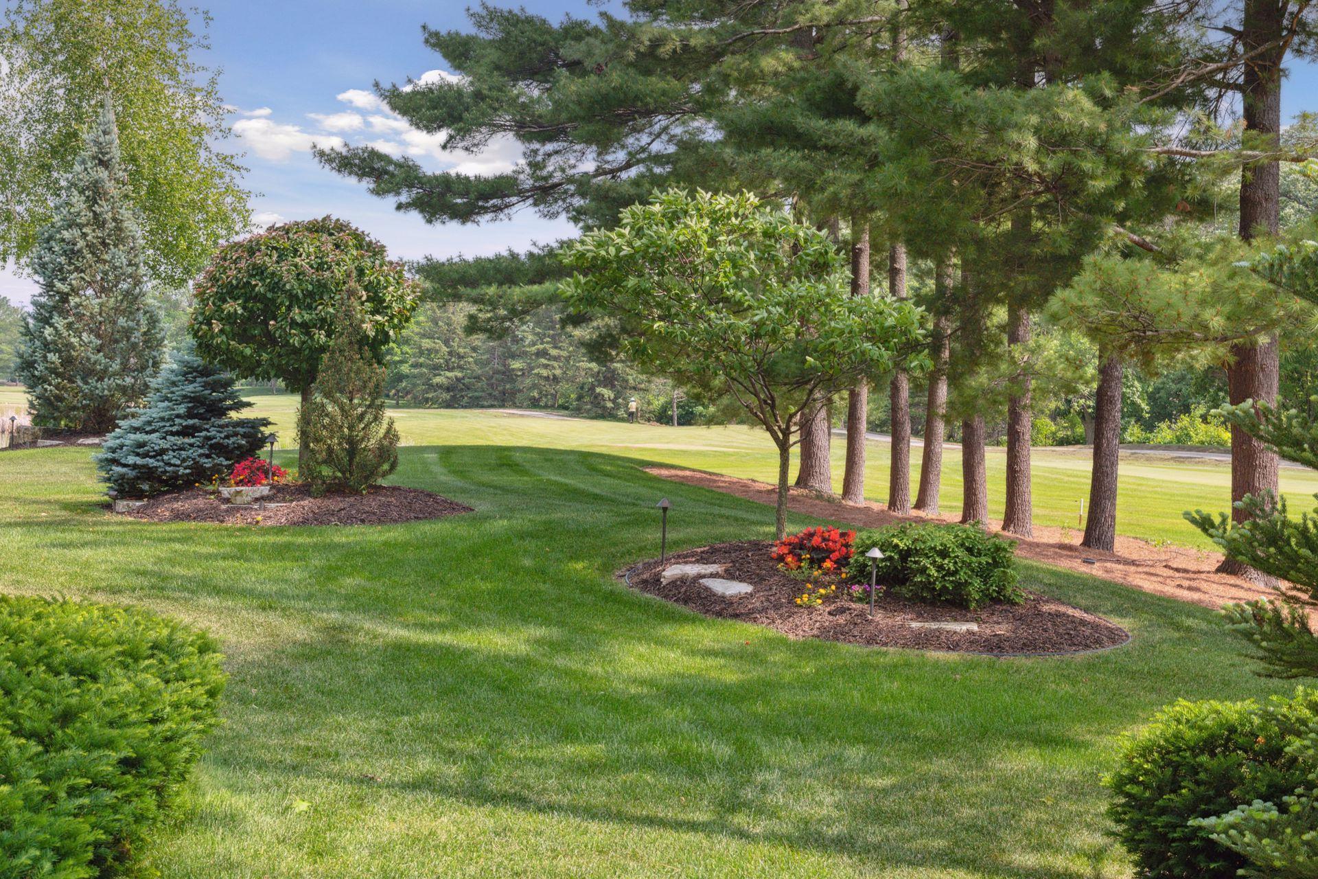 Pretty landscaping with views of the golf course beyond
