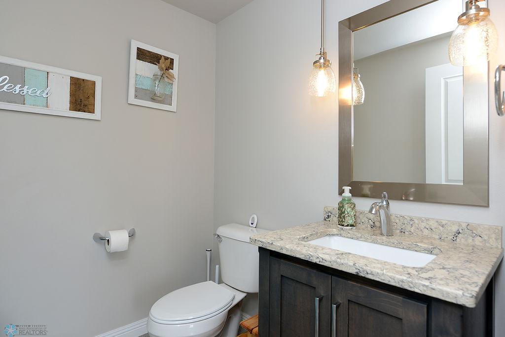 Main Floor Half Bath Off Back Entrance