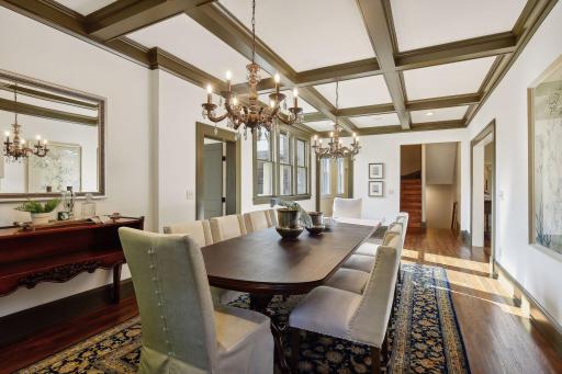 Box-beam ceilings adorn the formal dining room ceiling. A wonderful home for entertaining with great flow from formal and informal spaces.