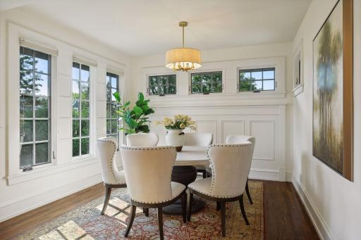 Informal dining nook with views of the backyard. Newer windows.