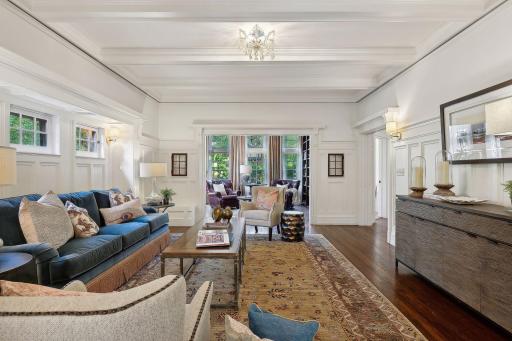 The family room connects to the cozy library.