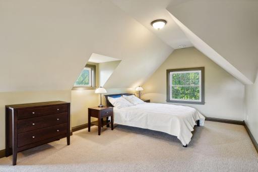3rd floor-5th bedroom with seating area and walk-in closet. 3/4 hall bath serves this bedroom and another bedroom on the 3rd floor.