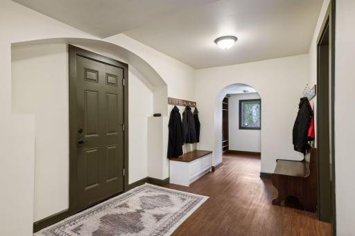 Enormous lower level mud room accommodates all of the Minnesota seasonal attire and equipment. Single-attached garage leads into this mudroom. Adjacent 3/4 bathroom. Exterior door is close to 2-car detached garage.