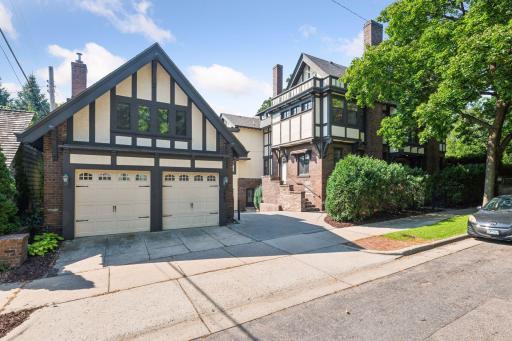 2-car detached garage with separate carriage house/ADU apartment above.