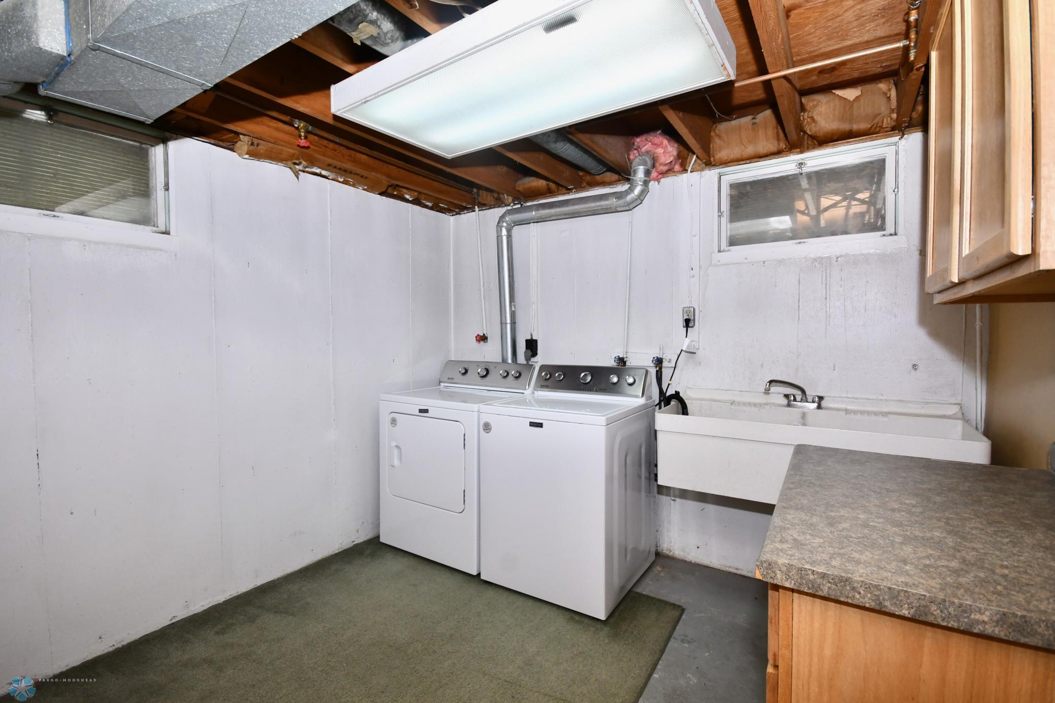laundry with sink