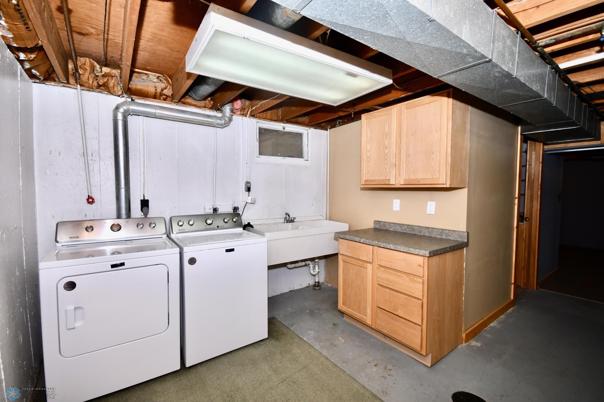 laundry with sink