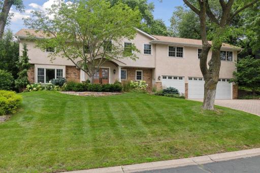 Set on a majestic deep and wide lot is this quintessential Edina 2-story. Every inch has been beautifully updated with top-of-the-line finishes, and a terrific addition over the garage added a stunning amusement room and private office.