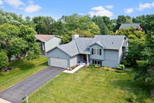 Welcome to this spacious split-level home in a quiet neighborhood in Chanhassen. Upgrades include 2022 Pella windows throughout most of the home, 2021 roof replaced with lifetime warranty shingles, new 2024 water softener and sump pump.