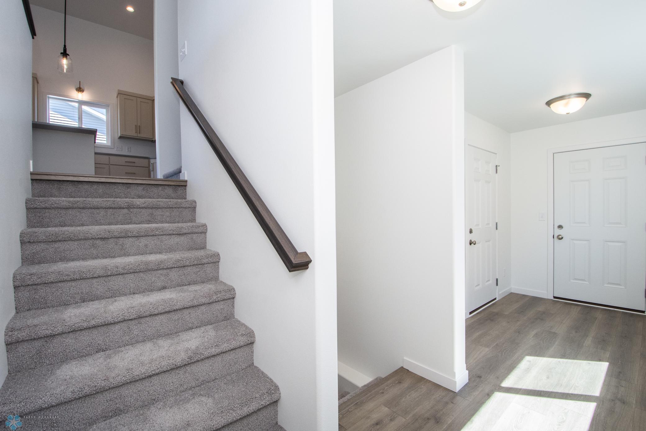 Stairs leading to Kitchen/Dining