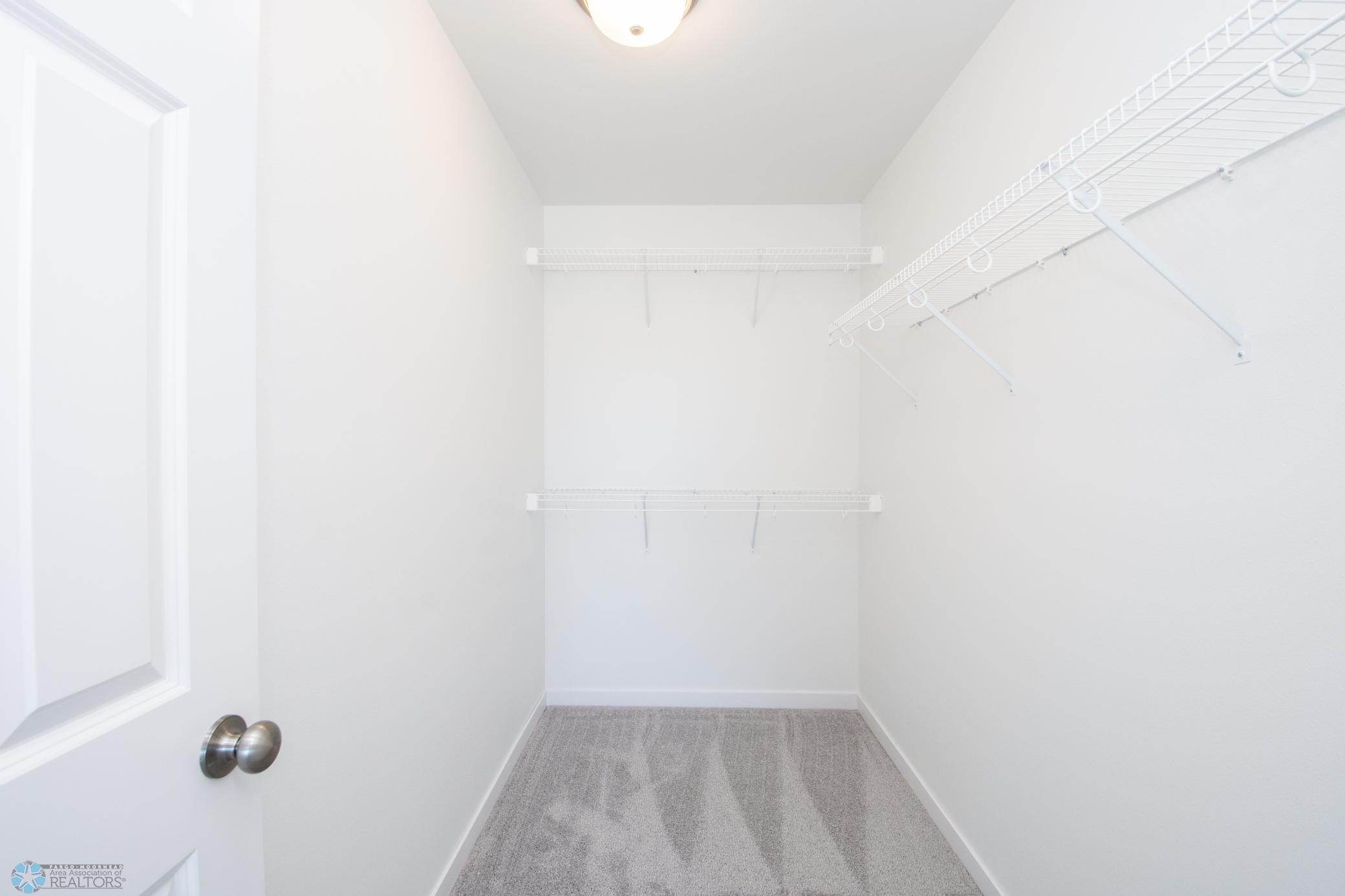 Primary Bedroom Walk in Closet