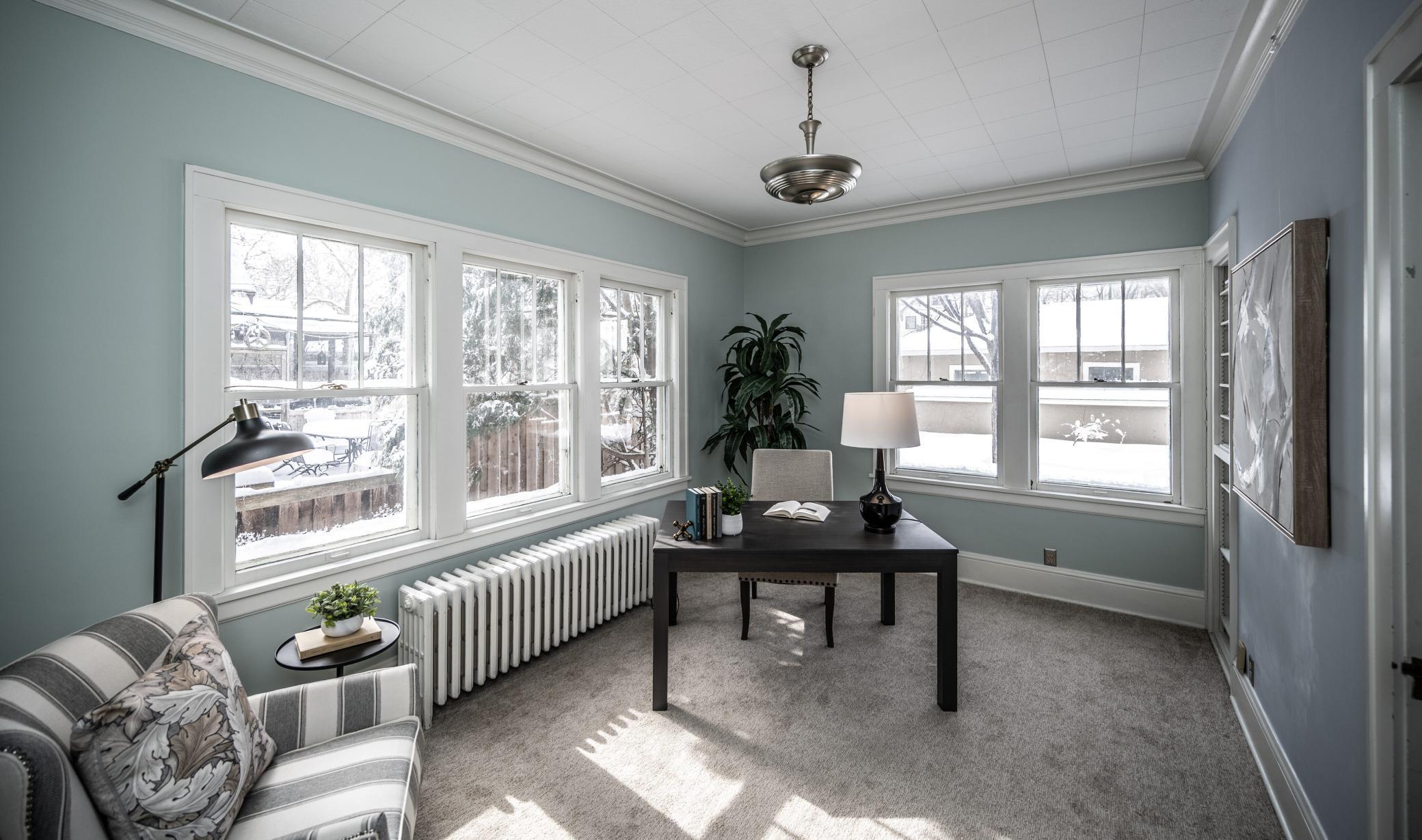 Main level Den / Sunroom faces southwest