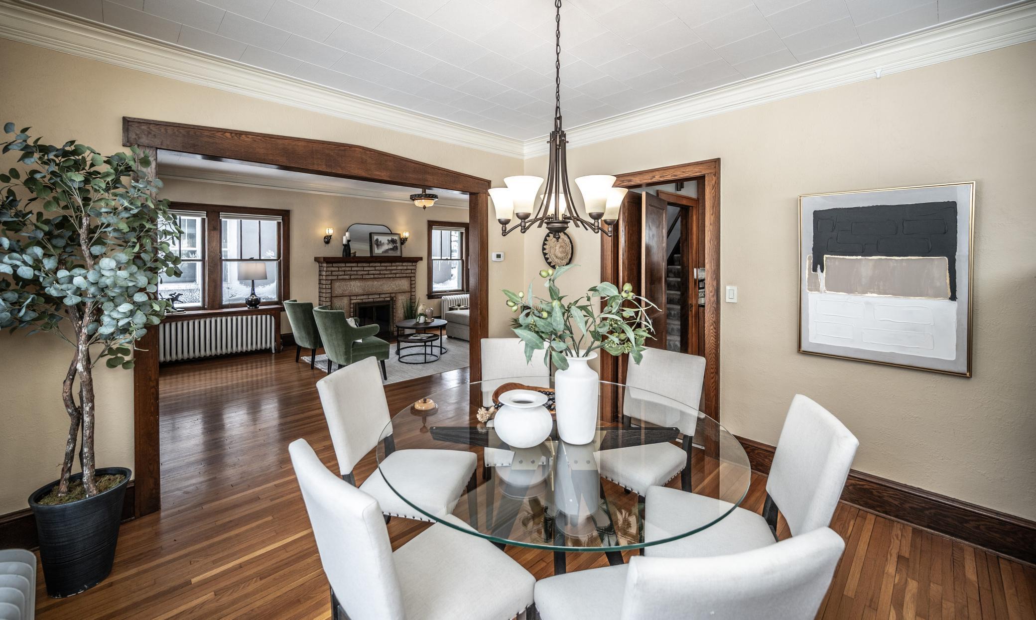 The formal Dining Room opens to the Living Room and Kitchen