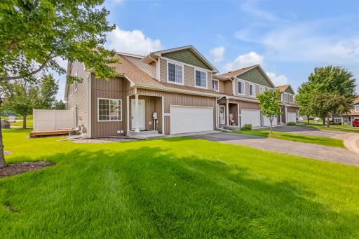 Beautiful End Unit In Perfect location with New Siding & Roof