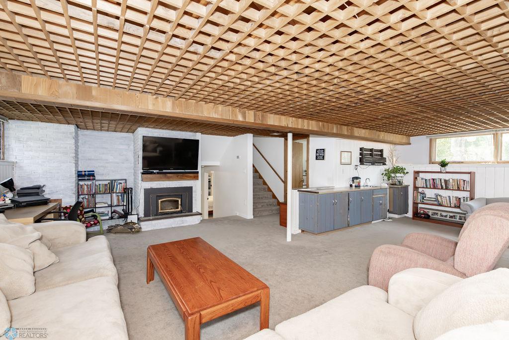 Family Room - Lower with Fireplace & Wet Bar