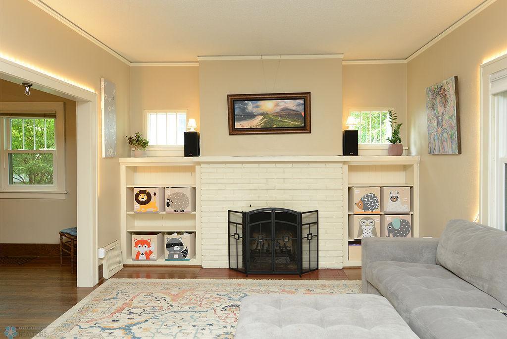 Wood fireplace with built ins