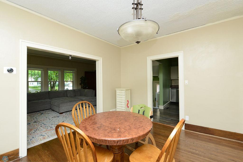 Dining room to living room and kitchen and kitchen