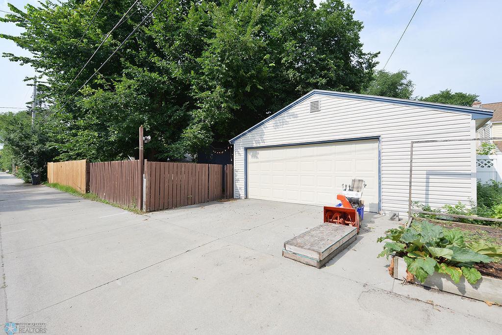 2 stall detached garage with alley access