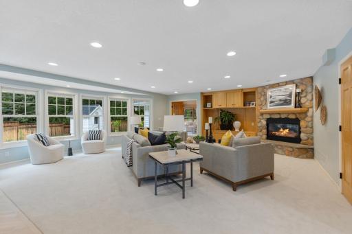 Cozy Family Room looks out to backyard pool