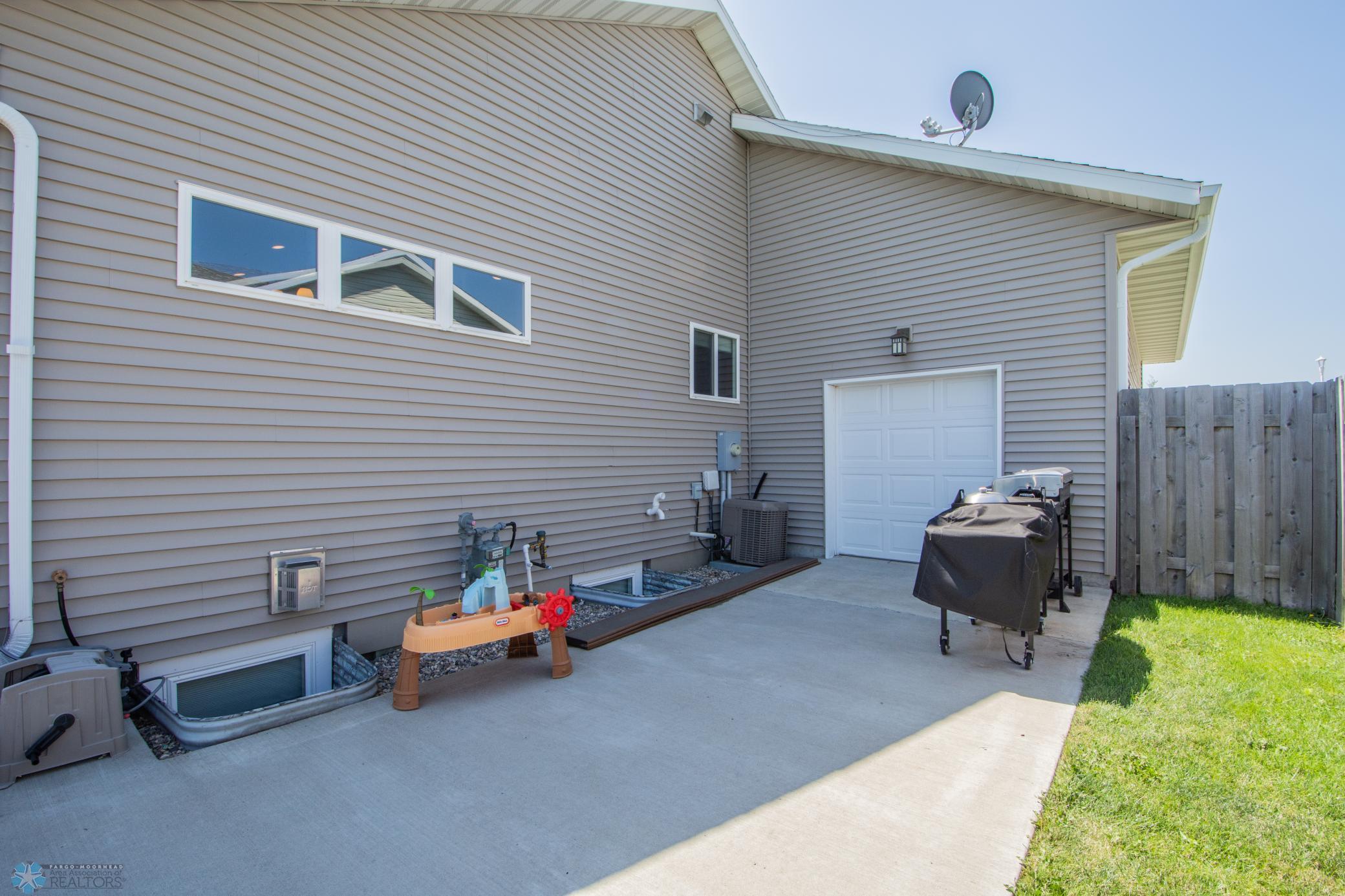 Patio access w/Overhead Door to Garage